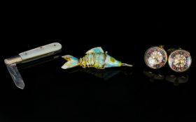 A Mixed Lot Containing articulated enameled fish,