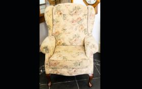 A Modern Wing Back Arm Chair Generously proportioned chair with queen anne legs,