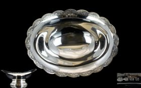 Queen Elizabeth II Contemporary Designed Sweetmeat Footed Bowl of Good Form and Quality.