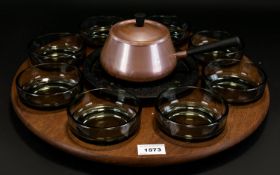 A 1970's Rotating Fondue Set Comprising circular rotating wooden tray complete with original