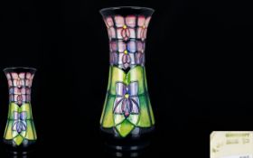 Moorcroft Modern Tube lined Vase ' Violets ' Pattern. Designer Sally Tuffin.