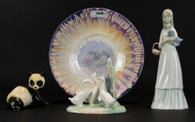 A Collection Of Ceramic Figures And Bowl Four items in total to include art pottery lustre bowl,