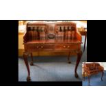 A Mahogany Writing Bureau raised on claw