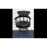 A Modern Captains Chair Office/captains swivel chair raised on industrial style base with castors,