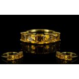 Citrine Five Stone Band Ring, five octagon cut citrines, each of .5ct, in the form of square cuts
