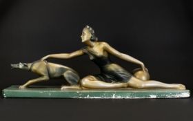 Art Deco French Plaster Figure Group A large example raised on rectangular plinth in the form of
