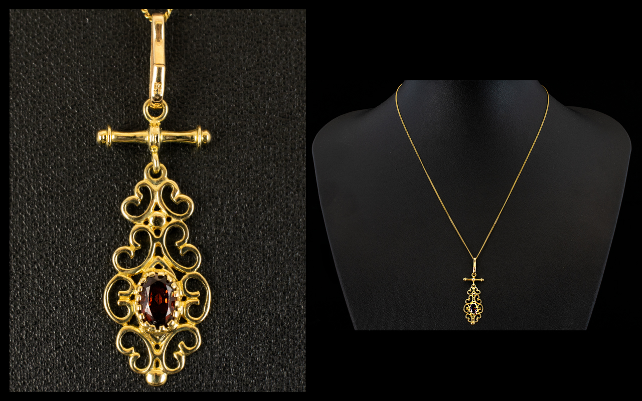 9ct Gold Topaz Set Pendant with Attached 9ct Gold Chain.