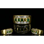 18ct Gold - Good Quality Attractive Emerald and Diamond Channel Set Ring, The Emeralds Between Two
