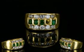 18ct Gold - Good Quality Attractive Emerald and Diamond Channel Set Ring, The Emeralds Between Two