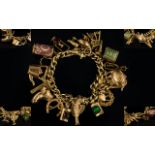 Wonderful 9ct Gold Vintage Charm Bracelet Loaded with 22 Top Quality 9ct Gold Charms.