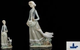 Lladro Porcelain Figurine ' Girl with Goose ' Model 4815. Issued 1972 - 1991. Height 12.