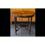 Edwardian Mahogany Occasional Table Of oval form with inlay detail to top,