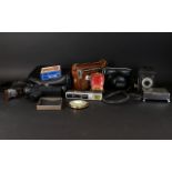 A Collection Of Vintage Cameras And Collectibles Comprising Yashika 45mm camera, Vernax box Brownie,