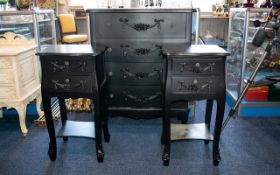 A Suite of Bedroom Furniture in matte black contiboard with garland decoration in the French style,