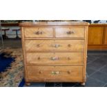 A Rustic Bleached Walnut Chest of Drawers.