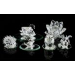 A Collection Of Swarovski Crystal Items To include, candle holder in the form of a waterlily bloom,