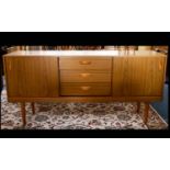 A 1970s Shreiber Sideboard, rectangular mid-century sideboard with three central drawers with