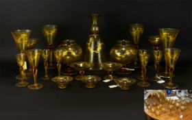 A Quantity Of Amber Coloured Murano Glass Table Ware each 54 pieces in total,