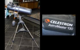 Celestron AstroMaster 130 Telescope And Tripod Please see accompanying image