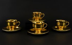 A Royal Winton Gold Lustre Cup And Saucer Set Four in total, each marked to base,