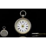 Swiss 1920's Ladies Silver Open Faced Fob Watch With fancy and ornate porcelain dial and gold