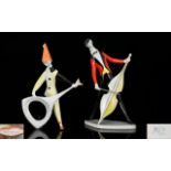 Two Mid Century Hungarian Porcelain Figurines By Aquincum Each in the form of standing musicians,