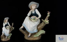 Nadal - Lladro Style Hand Painted Porcelain Figure - Young Girl Seated on a Tree Stump with Basket