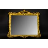 Antique Gilt Frame Mirror Rectangular mirror in ornate gilt gesso frame with scroll and scallop