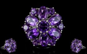 A Sterling Silver And Amethyst Set Statement Ring Exaggerated flowerhead setting with 4.41cts of