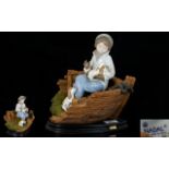 Nadal - Lladro Style Fine Quality Hand Painted Porcelain Figurine - Young Boy with puppies sitting