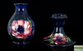 Moorcroft Small Tubelined Squat Candlesticks ' Clematis ' Design on Blue Ground. c.1970's. Height 3.