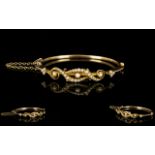 Victorian Period - Well Designed 15ct Gold Hinged Bangle with Safety Chain,