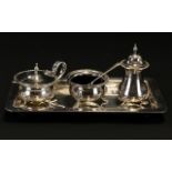 A silver plated Cruet Set Early 20th Century four piece set to include rectangular tray,