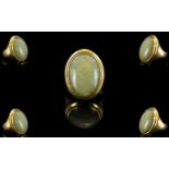 18ct Gold Single Stone Oval Shaped Chalcedony Set Dress Ring.