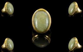 18ct Gold Single Stone Oval Shaped Chalcedony Set Dress Ring.