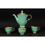 Stavangerflint Norwegian Part Tea Set Four pieces with gilt interiors and eau de nil ground.