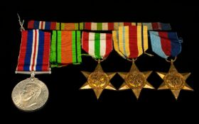 World War II Trio of Military Medals ( 4 ) + Bar / Ribbon. Comprises 1/ 1939 - 1945 Defence Medal.