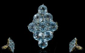 Sky Blue Topaz Statement Ring, 13cts of round cut sky blue topaz, over nine large stones in a