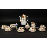 A Japanese Porcelain Coffee Set comprising 6 cups and saucers, milk jug and sugar bowl. Together