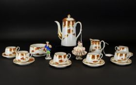 A Japanese Porcelain Coffee Set comprising 6 cups and saucers, milk jug and sugar bowl. Together