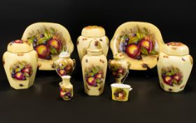 Aynsley Pottery A Collection of Orchard Gold Fruits Pattern Pottery To include two cake/sandwich