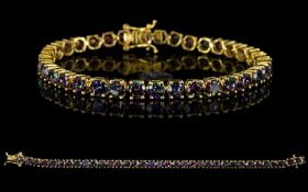 Northern Lights Mystic Topaz Tennis Bracelet, 21cts of the pinkish purple to green Northern Lights