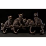 A Cast Iron 4 x Hook Key Rack. 11 Inches In The Form of 4 x Cats.