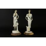 Pair Of Italian Hand Painted Modern Ceramic Figures, Both dressed as 1920's Flapper Girls.
