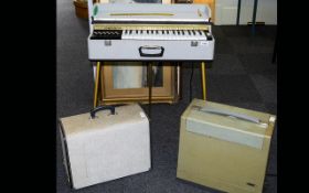 A Retro 'Major Companion' Travel Cased Electric Organ Complete with carry case and collapsible legs.