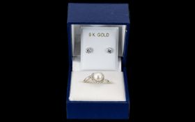 Fiorelli 9ct White Gold And Faux Pearl Ring Fully hallmarked for 9ct gold, the centre set with large