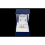 Fiorelli 9ct White Gold And Faux Pearl Ring Fully hallmarked for 9ct gold, the centre set with large