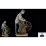 Lladro Porcelain Figure ' Sharpening The Cutlery ' Model No 5204. Issued 1984 - 1987 Retired.