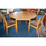 A 1970s Shreiber Dining Table and Four Chairs.