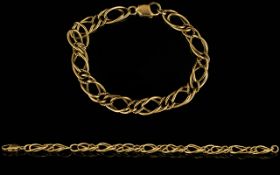 9ct Gold - Triple Link Fancy Bracelet with Good Quality Clasp. Fully Hallmarked for 9ct - 375 Gold.